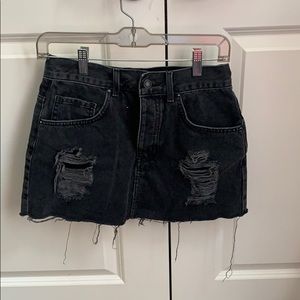 Ripped black jean skirt
